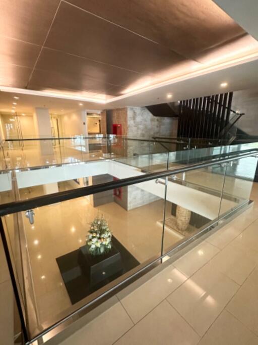 Modern and spacious building lobby with glass railings