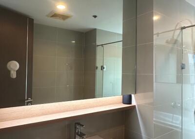 Modern bathroom with large mirror and sink