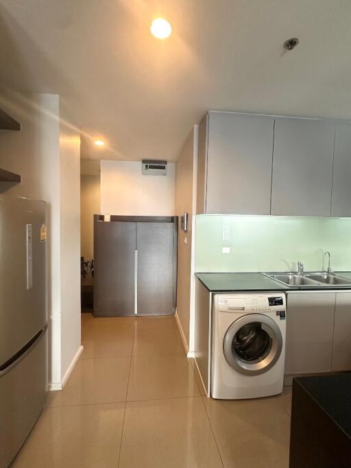 Modern kitchen with integrated laundry area