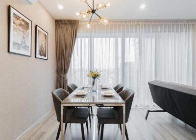 Modern dining room with contemporary lighting