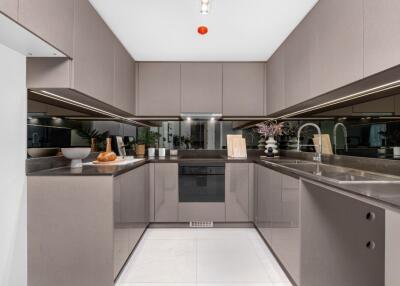 Modern kitchen with sleek cabinetry and stainless steel appliances