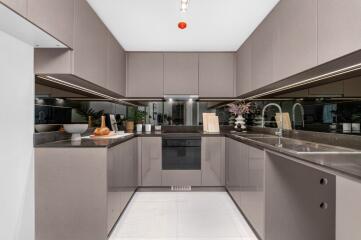 Modern kitchen with sleek cabinetry and stainless steel appliances