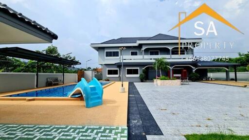 Spacious two-story house with swimming pool and large outdoor area