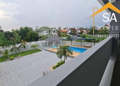 Outdoor view with pool and surrounding area