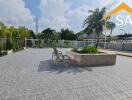 Spacious outdoor area with seating and landscaping