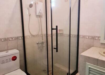 Bathroom with glass shower enclosure