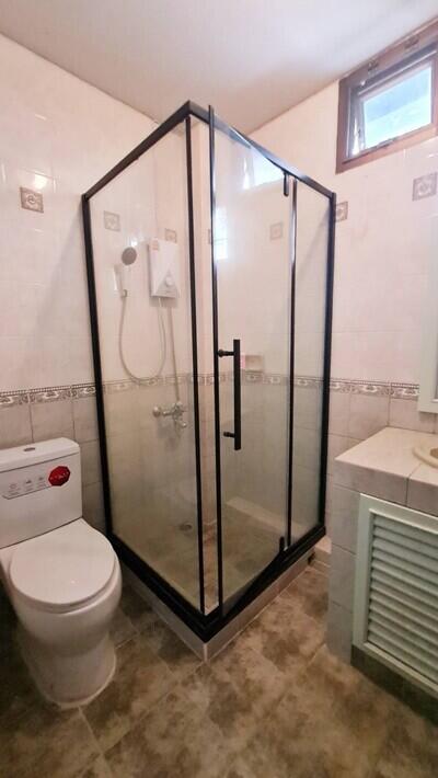 Bathroom with glass shower enclosure