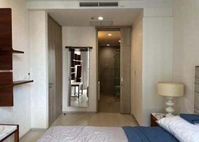 Modern bedroom with a view into the bathroom