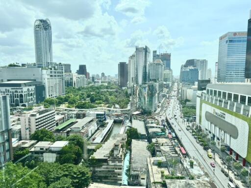 View of modern city with tall buildings and busy streets