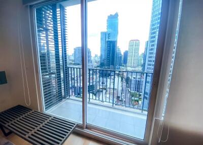 City view from the living area with sliding glass doors