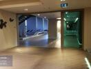 Lobby area with view of a modern indoor pool