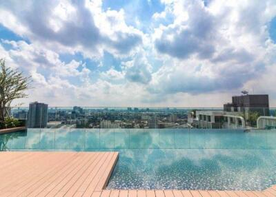 Rooftop infinity pool with city skyline view