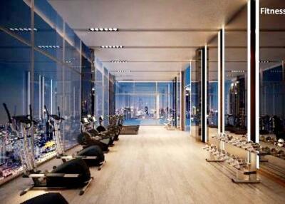 Spacious fitness room with city view