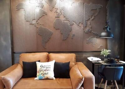 Cozy living room with world map wall art