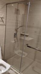 Modern bathroom with glass shower enclosure