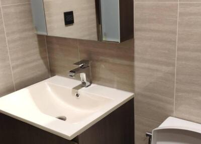 Modern bathroom with vanity and mirror