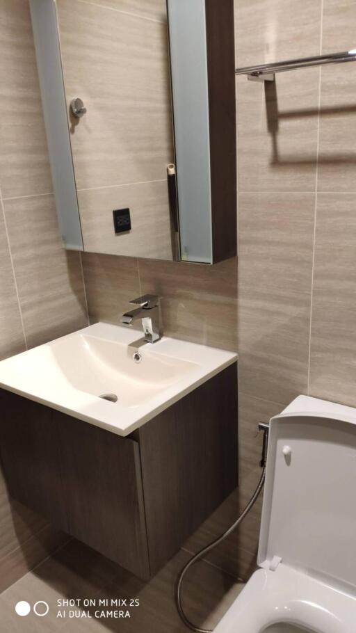 Modern bathroom with vanity and mirror