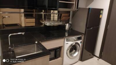 Modern kitchen with appliances and storage space