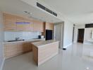 Modern kitchen with wooden cabinets and island