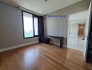 Bedroom with large window and study area