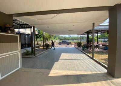 Covered patio area with garden view