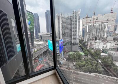 View from a room showcasing cityscape and buildings