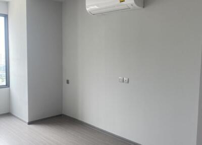 Empty bedroom with air conditioner