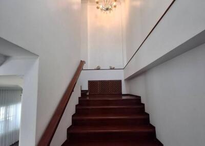 Staircase with chandelier