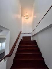 Staircase with chandelier