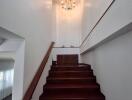 Staircase with chandelier