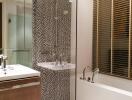 Modern bathroom with mosaic tile shower