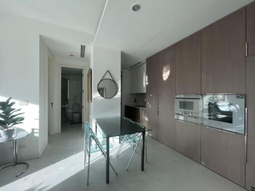 Modern kitchen with built-in appliances and minimalist design