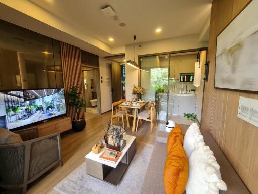 Spacious living room with modern decor and dining area