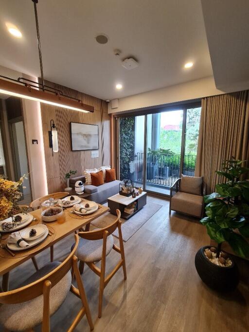 modern living and dining area with balcony view