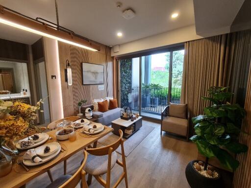 Modern living room with dining area and balcony