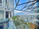 Building with outdoor greenery and city view