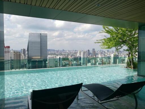 Infinity pool with city skyline view