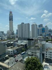 Cityscape view from high-rise building with blue sky