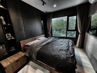 Spacious and modern bedroom with large windows