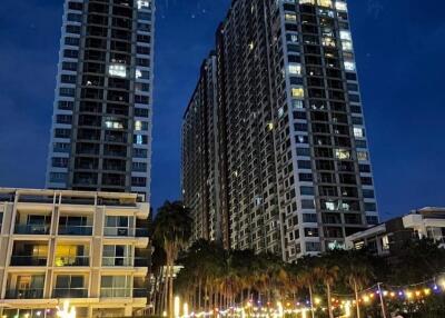 High-rise buildings with outdoor social area at night