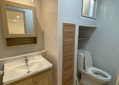 Modern bathroom with vanity and toilet