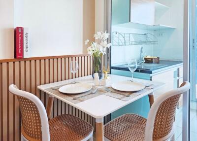 Cozy kitchen dining area with table set for two