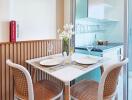 Cozy kitchen dining area with table set for two