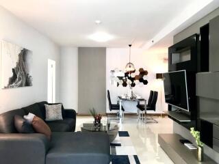 Modern living room with adjacent dining area