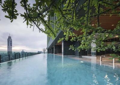 Infinity pool with city skyline views