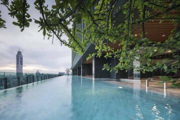 Infinity pool with city skyline views