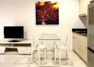 Modern kitchen with a small dining area