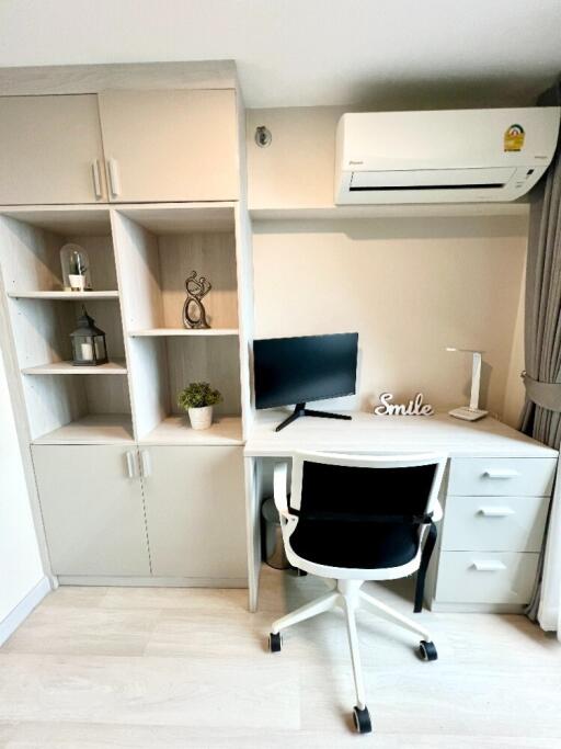 Compact and functional home office setup within a bedroom