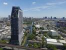 Cityscape view with tall building and river