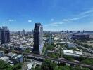 View of cityscape with modern buildings and clear blue sky